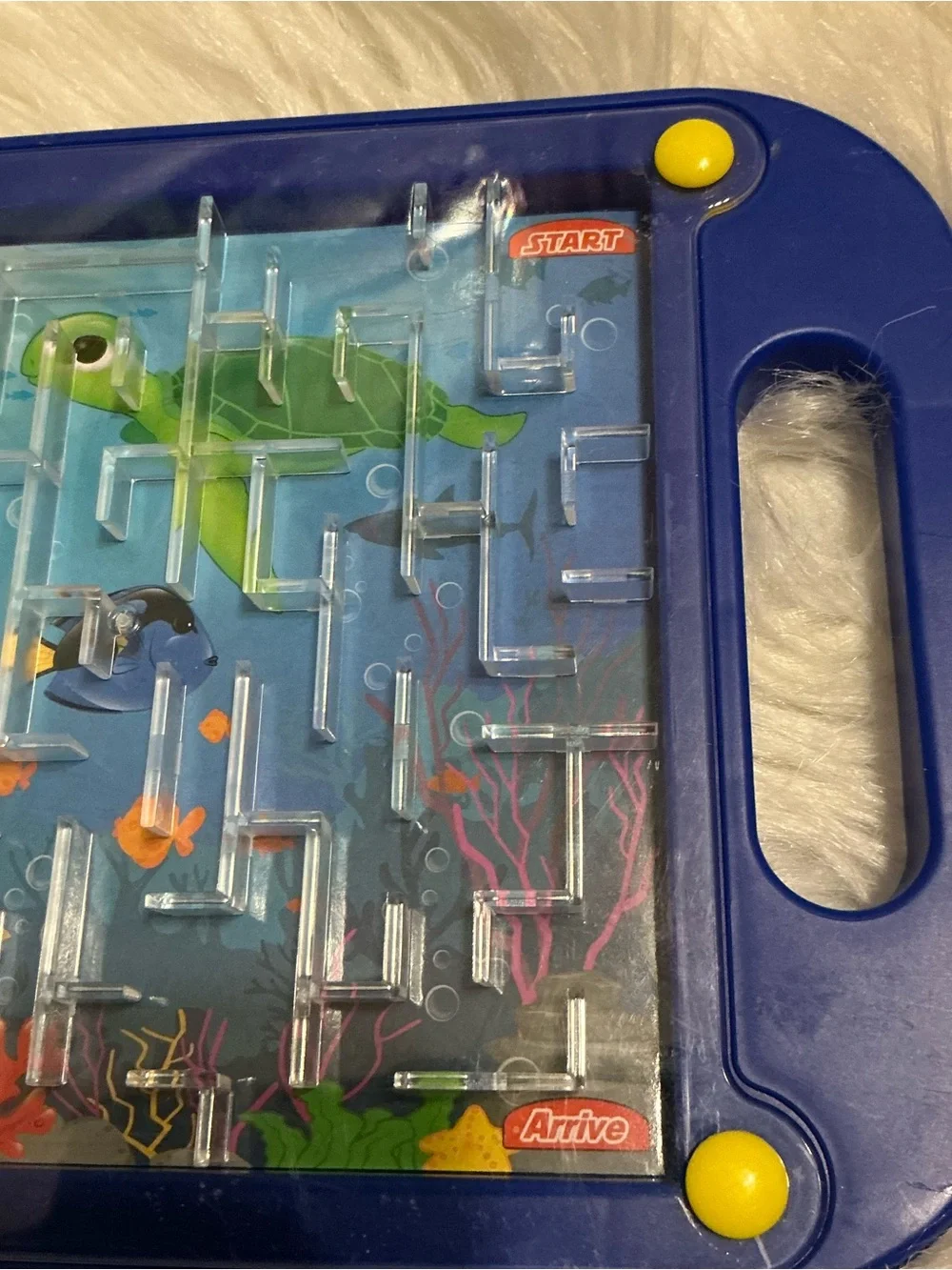 Retro-style handheld maze game for children